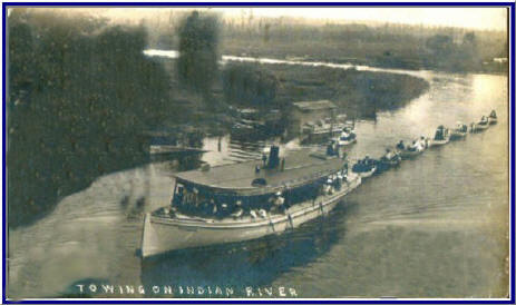 Towing rowboats on Indian River